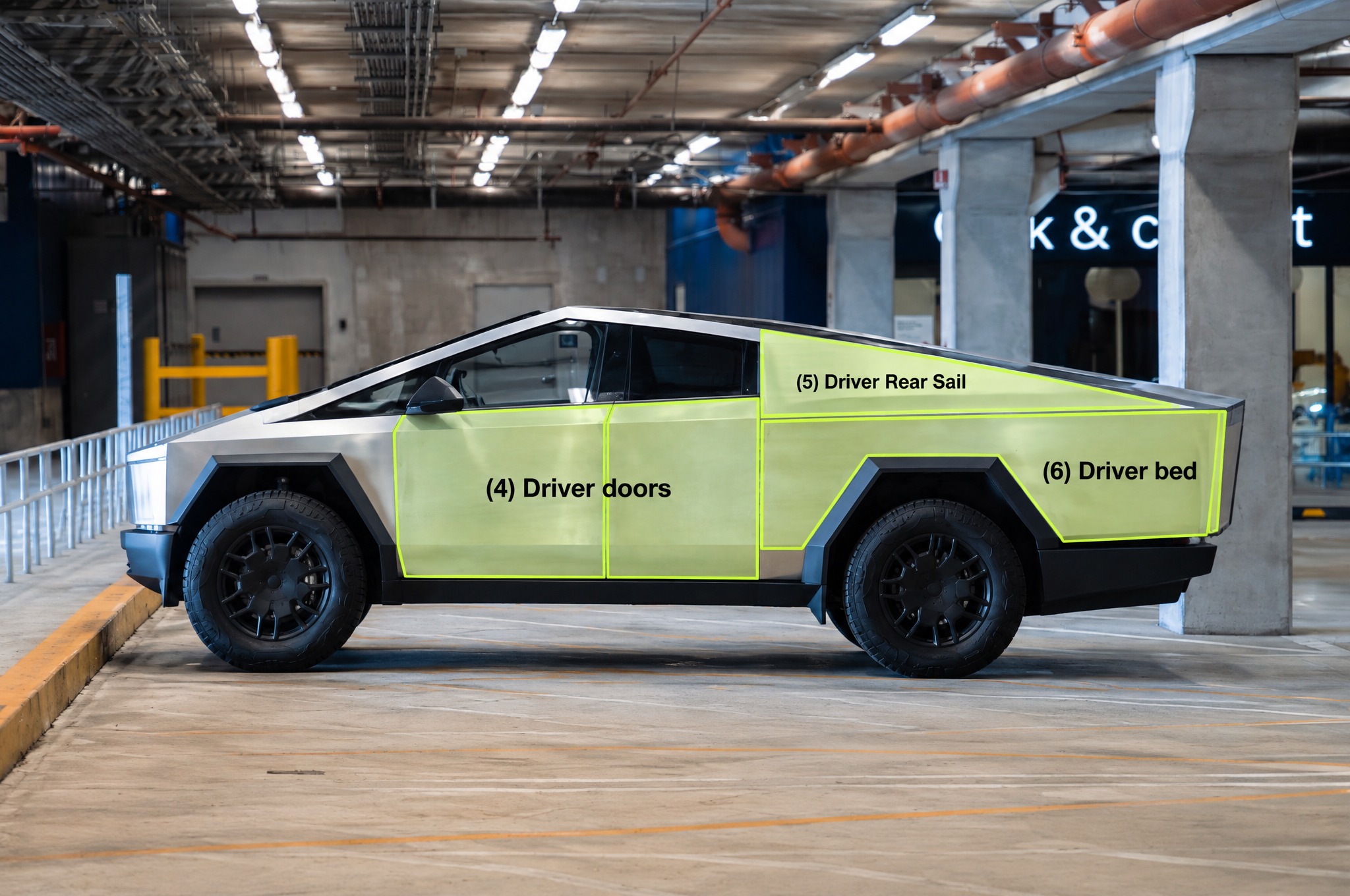 Cybertruck with the 11 ad panels outlined